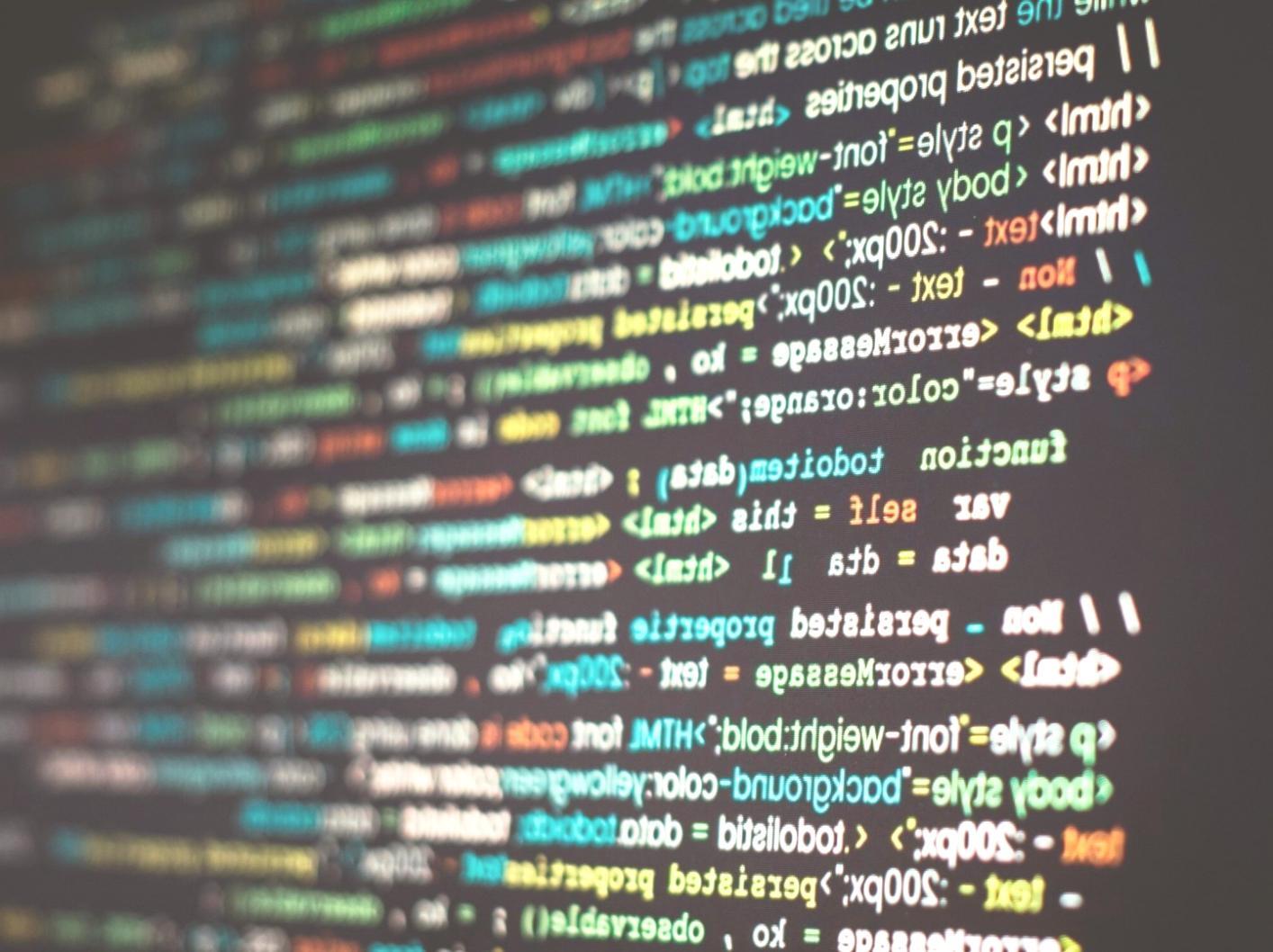 Mobile app user interface design mockups on desk
